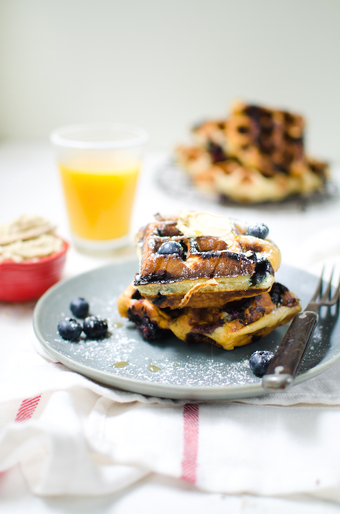 A stack of blueberry buttermilk waffles.