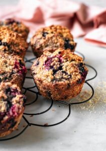 Gluten-free mixed berry muffins with toasted coconut.