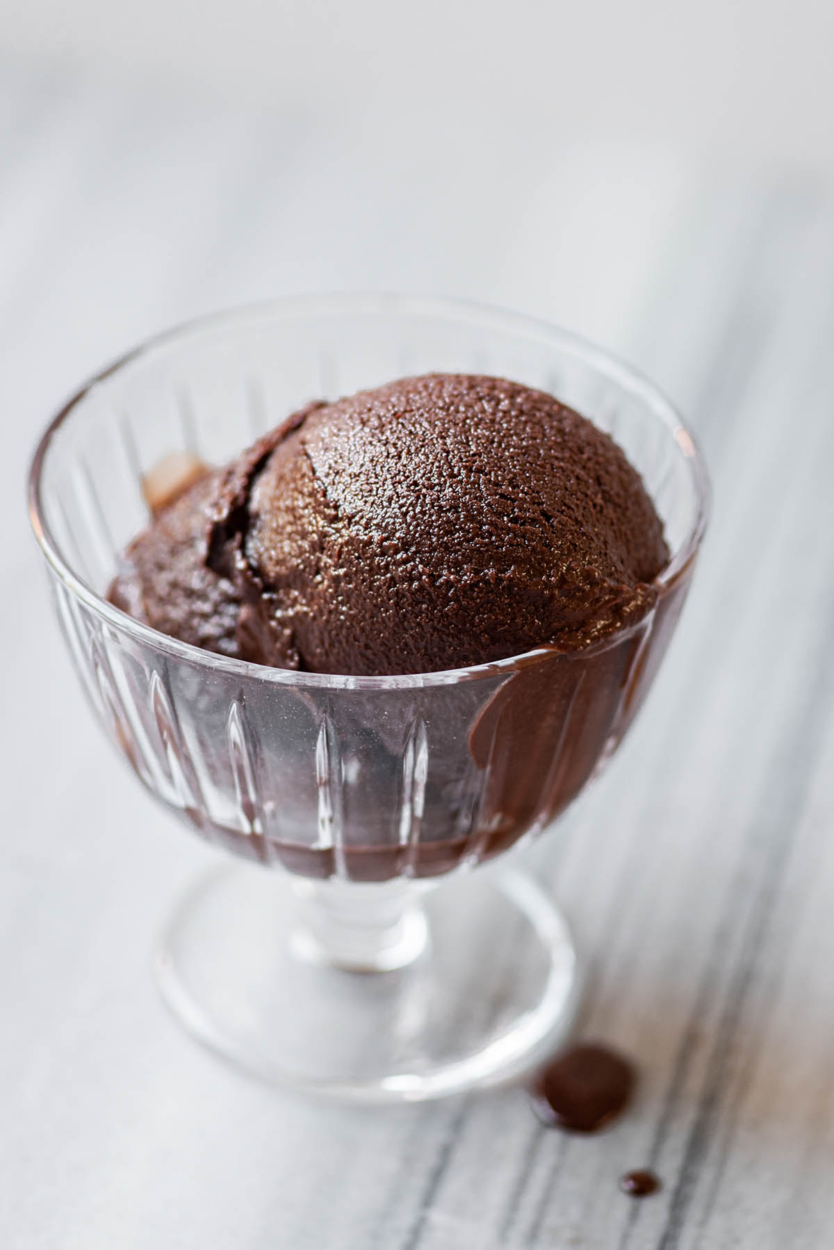 A bowl of chocolate ice cream.