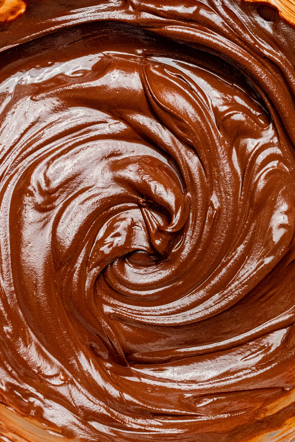 Close up of swirled melted chocolate.
