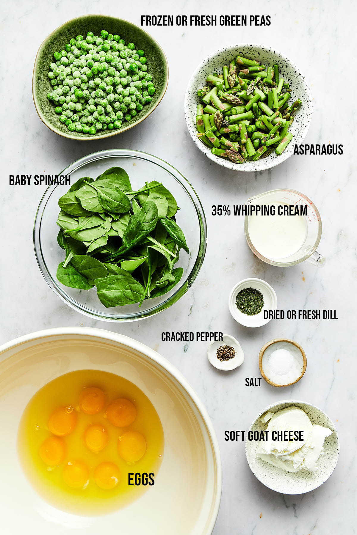 Ingredients to make baked asparagus frittata with peas, spinach, & goat cheese.