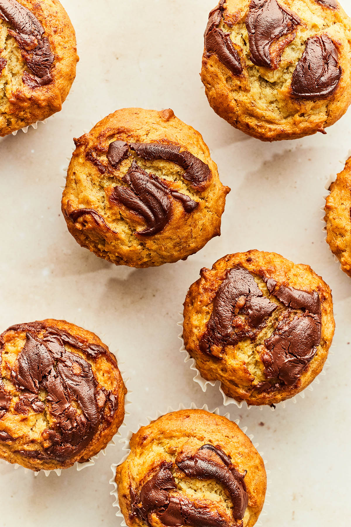 Overhead close up of banana Nutella muffins.