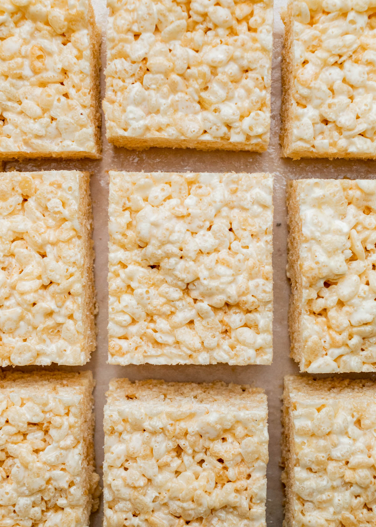 Close up overhead image of puffed rice marshmallow squares.