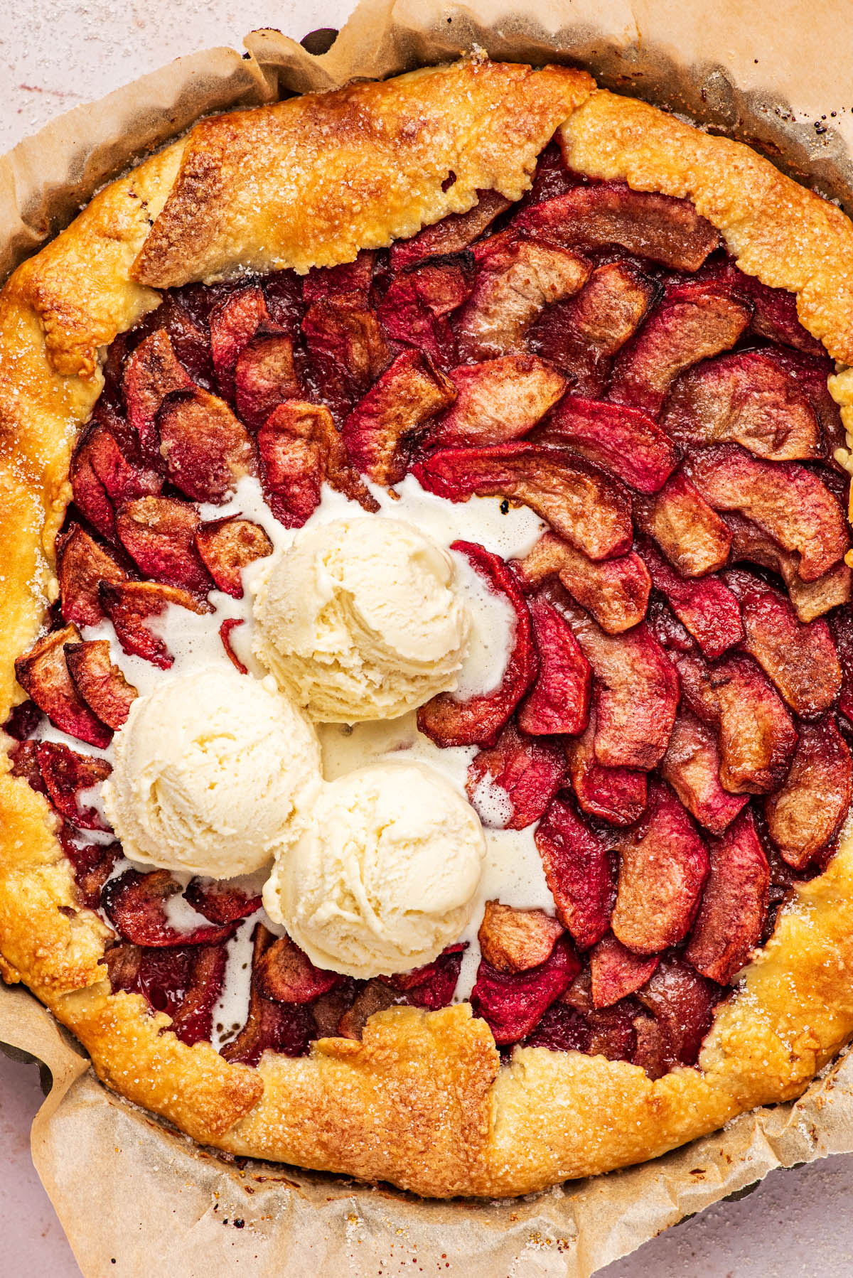 Close up of vanilla ice cream topped galette.