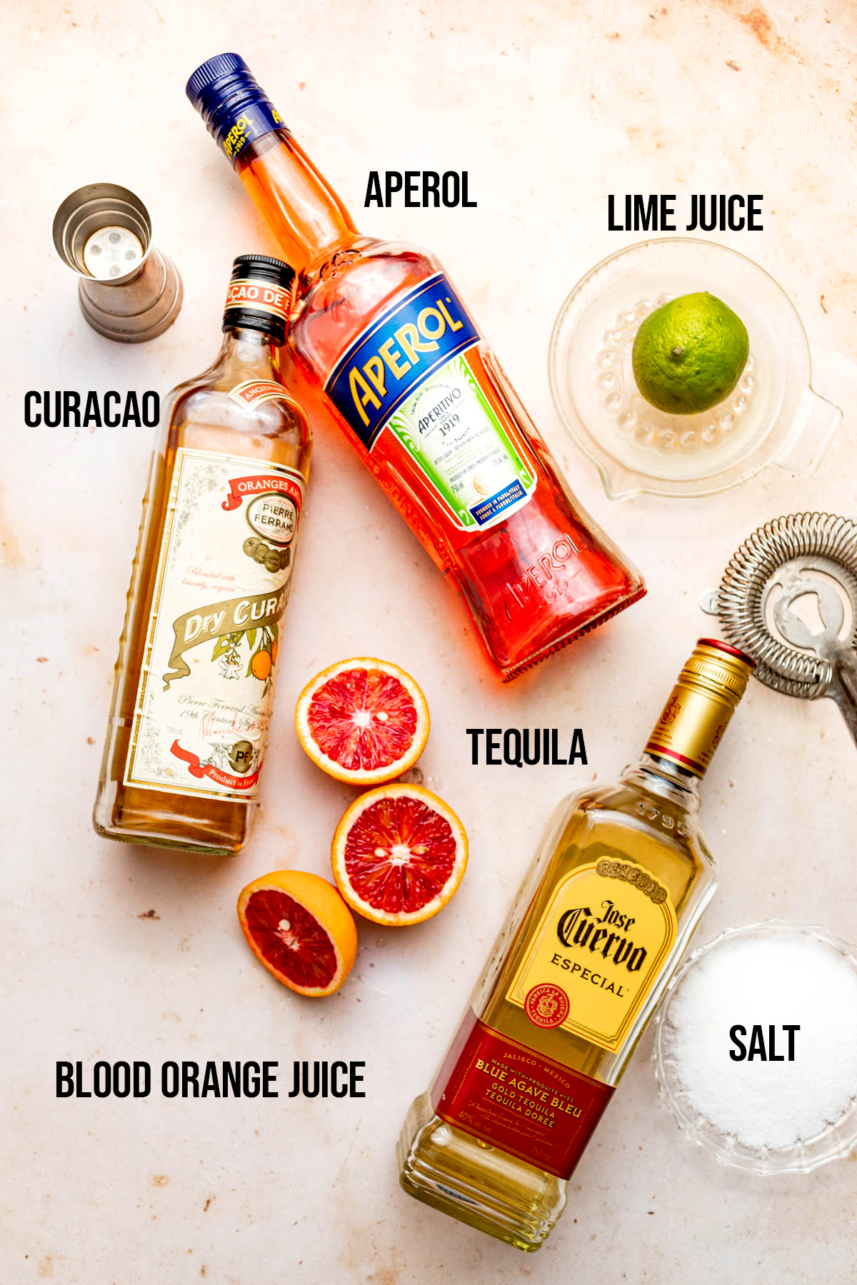 Ingredients to make a blood orange margarita.