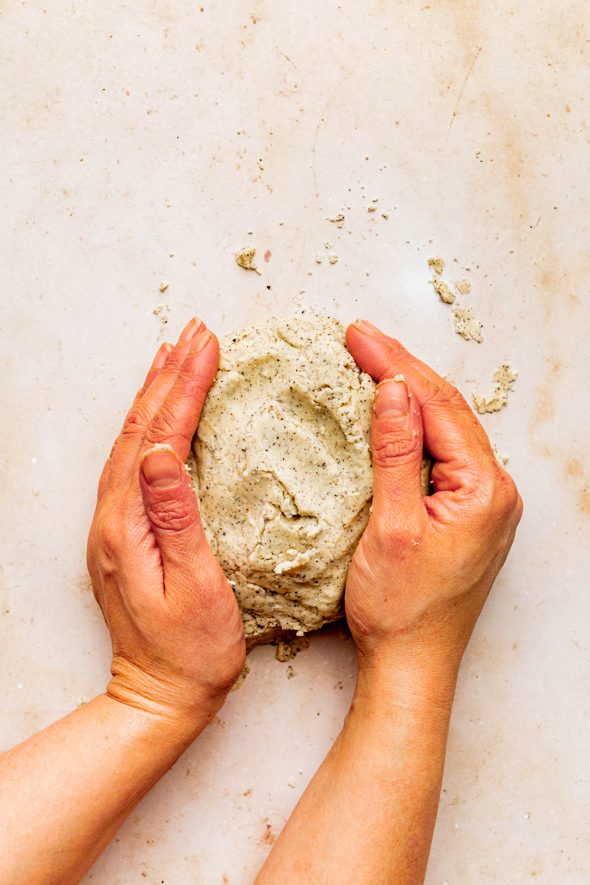 Shaping the dough into a rough ball.