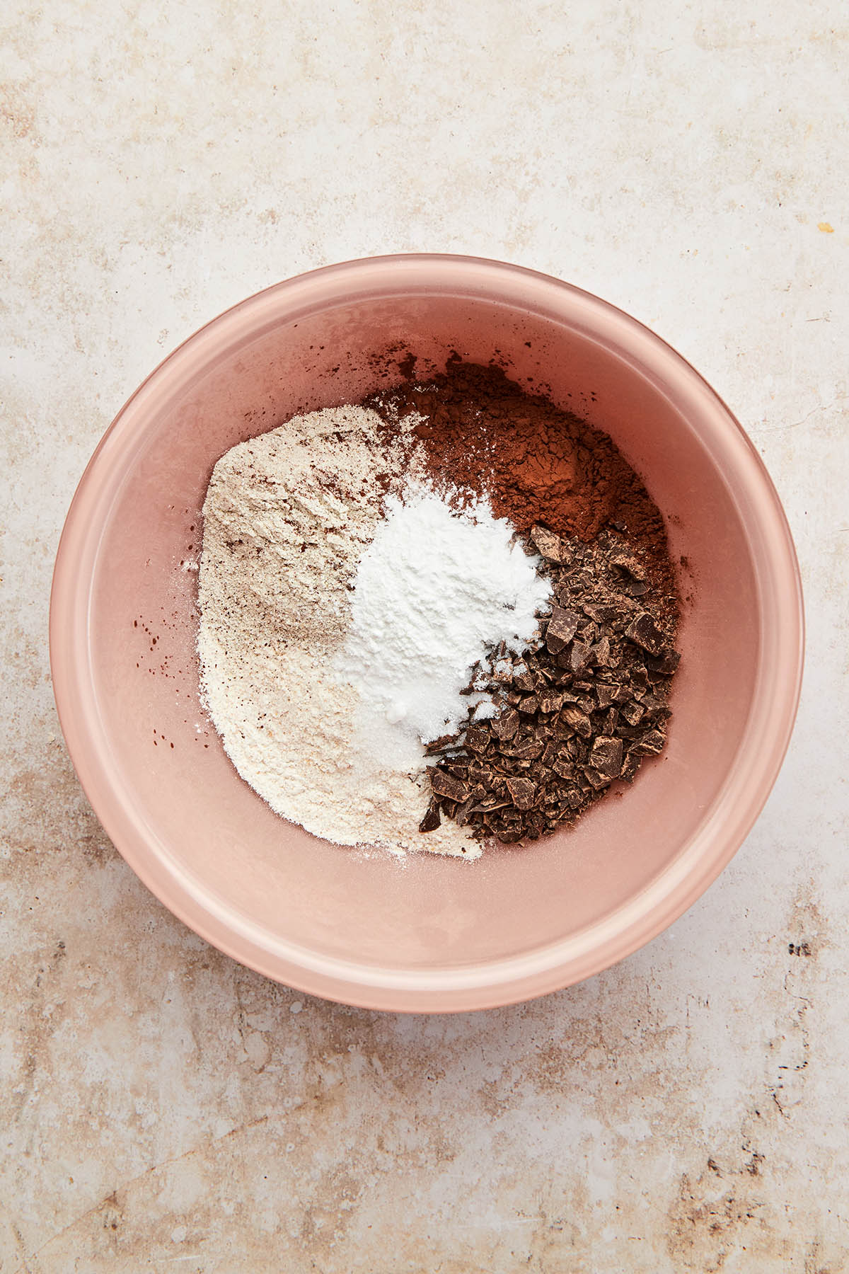 Unmixed dry cake ingredients in a bowl.