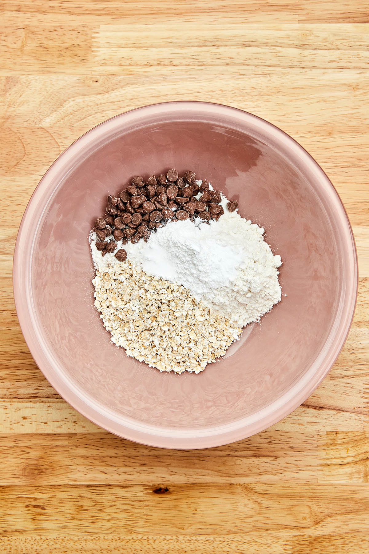 Unmixed dry ingredients in a bowl.