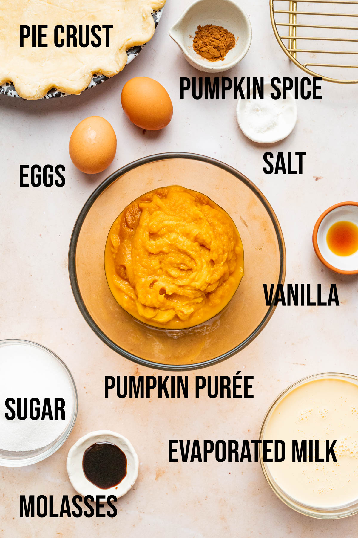 Ingredients to make pumpkin custard pie.